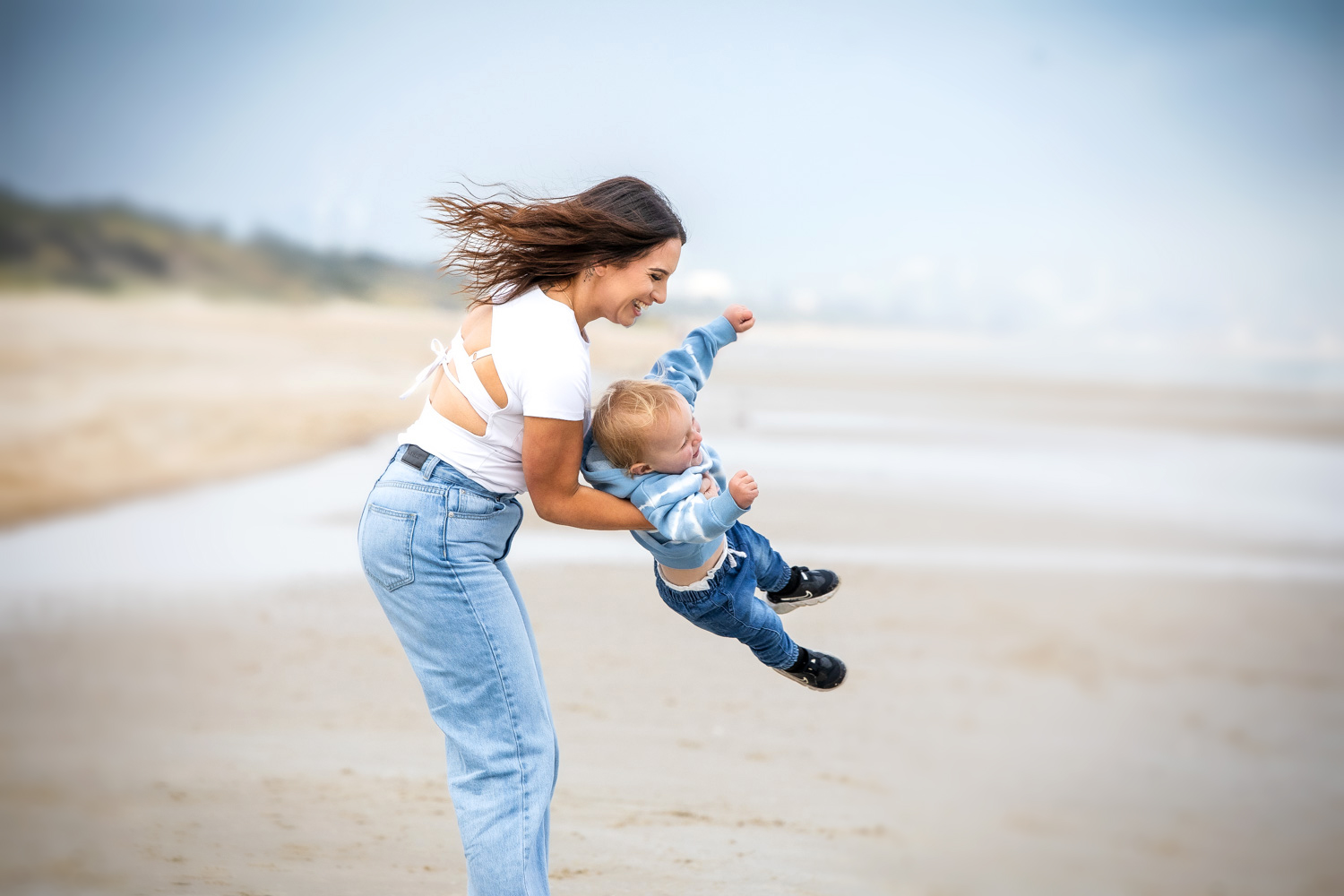 Mother and son beach candid
